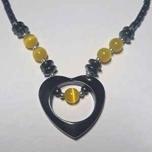 Hematite Heart Pendant Necklace with Yellow Cats Eye Beads